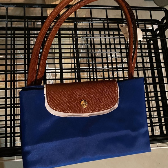 Longchamp Handbags - Longchamp large tote in blue.